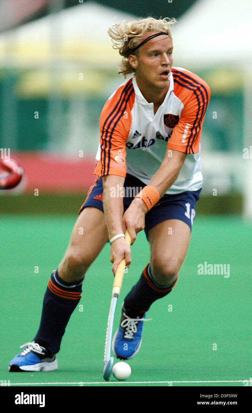 The photo shows the Dutch international field hockey player Floris