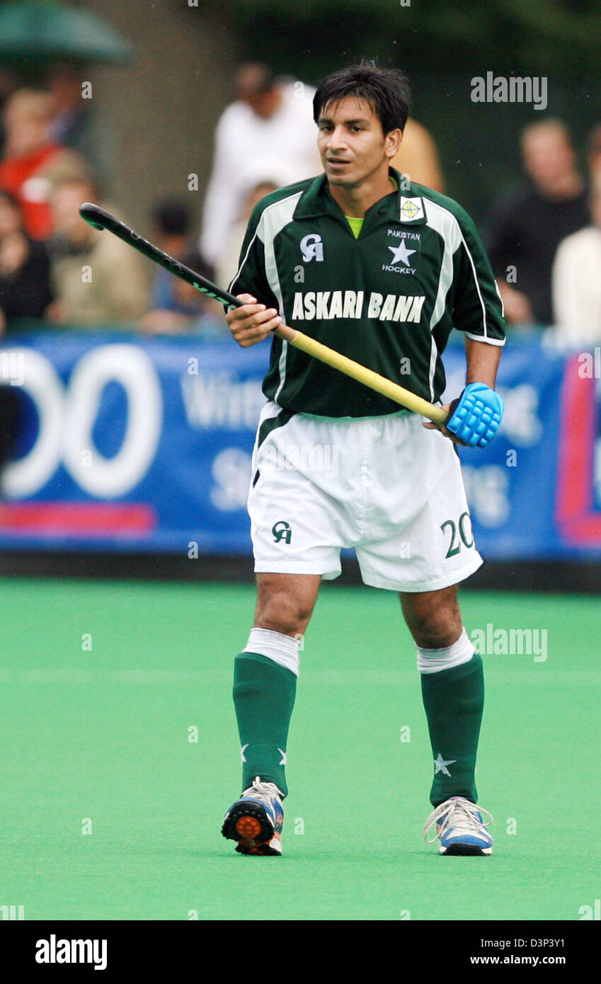 The photo shows the Pakistani international field hockey player Waseem Ahmed in action during