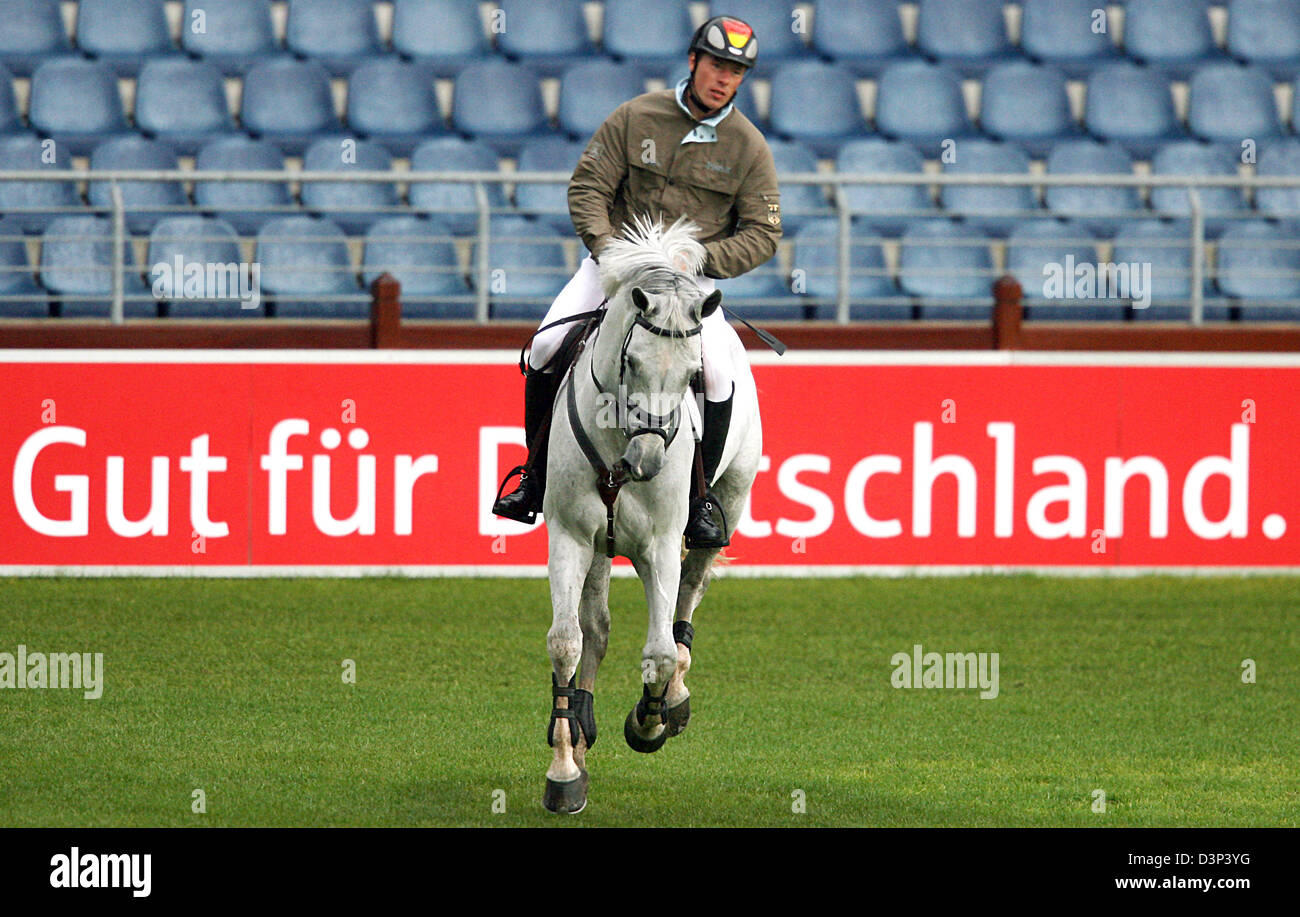 The German Show Jumper Christian Ahlmann Rides His Horse Coester During The Practice Session Of The Show Jumpers In Aachen Germany Monday 28 August 2006 The Show Jumping Contest Will Beginn On
