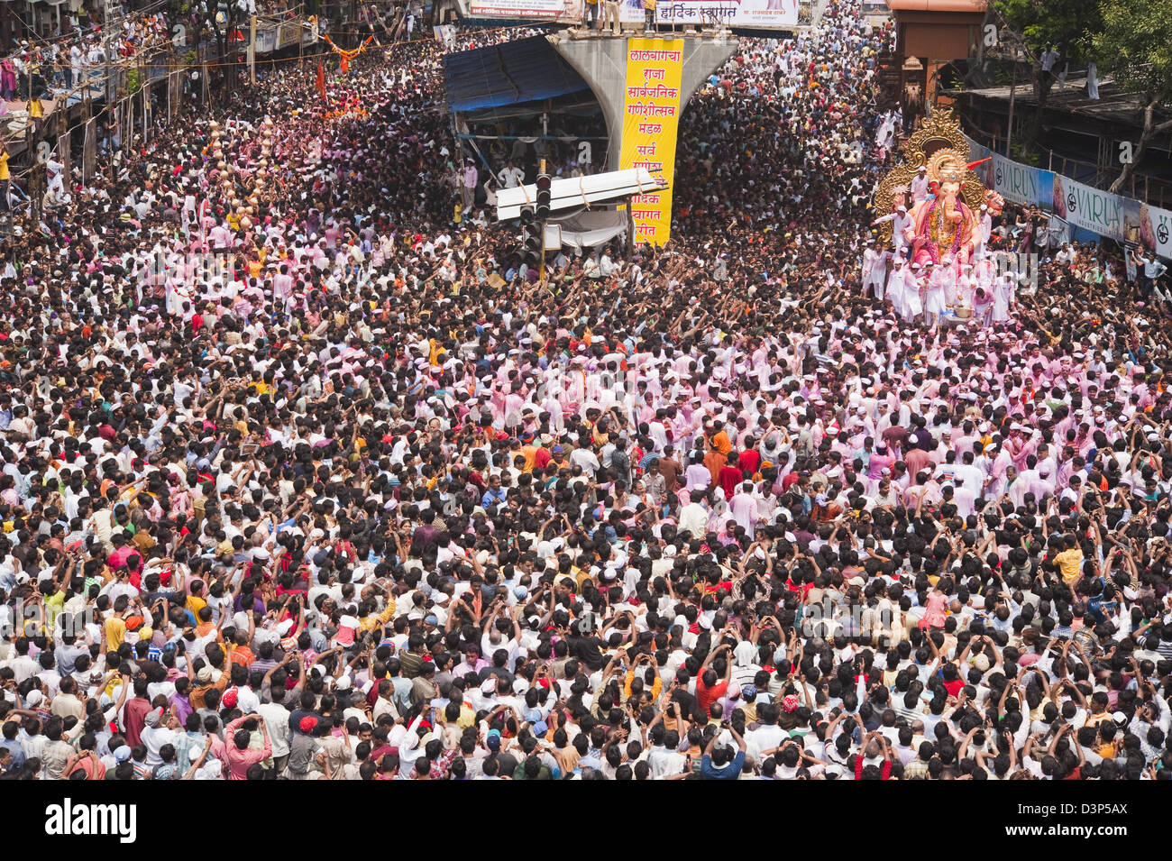 Crowd at religious procession during Ganpati visarjan ceremony, Mumbai