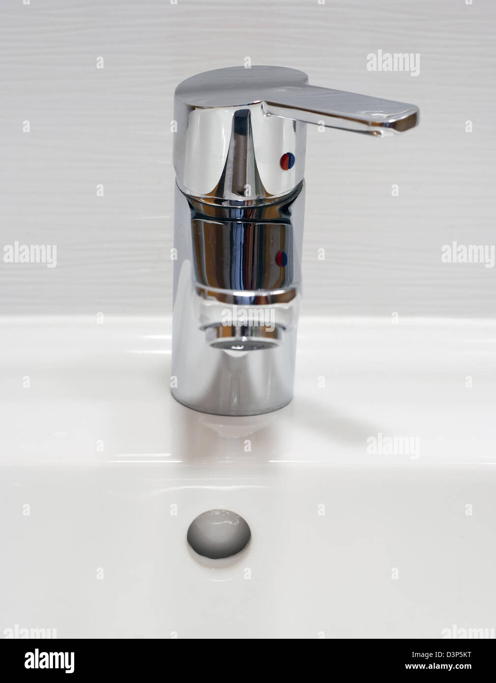 Detail of a chrome bathroom sink Stock Photo Alamy