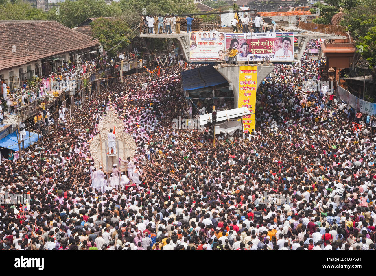 Crowd at religious procession during Ganpati visarjan ceremony, Mumbai