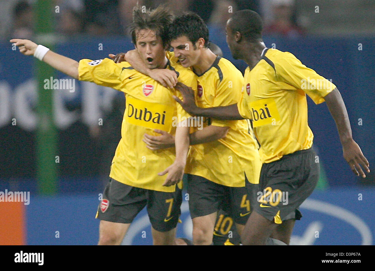 FC Arsenal London players (L-R) Tomas Rosicky, Cesc Fabregas and Johan Djourou celebrate after Rosicky's 2:0 goal in the UEFA Champions League match at the AOL-Arena in Hamburg, Germany, Wednesday, 13 September 2006. Arsenal won 2-1 against Hamburger SV taking three points. Photo: Maurizio Gambarini Stock Photo