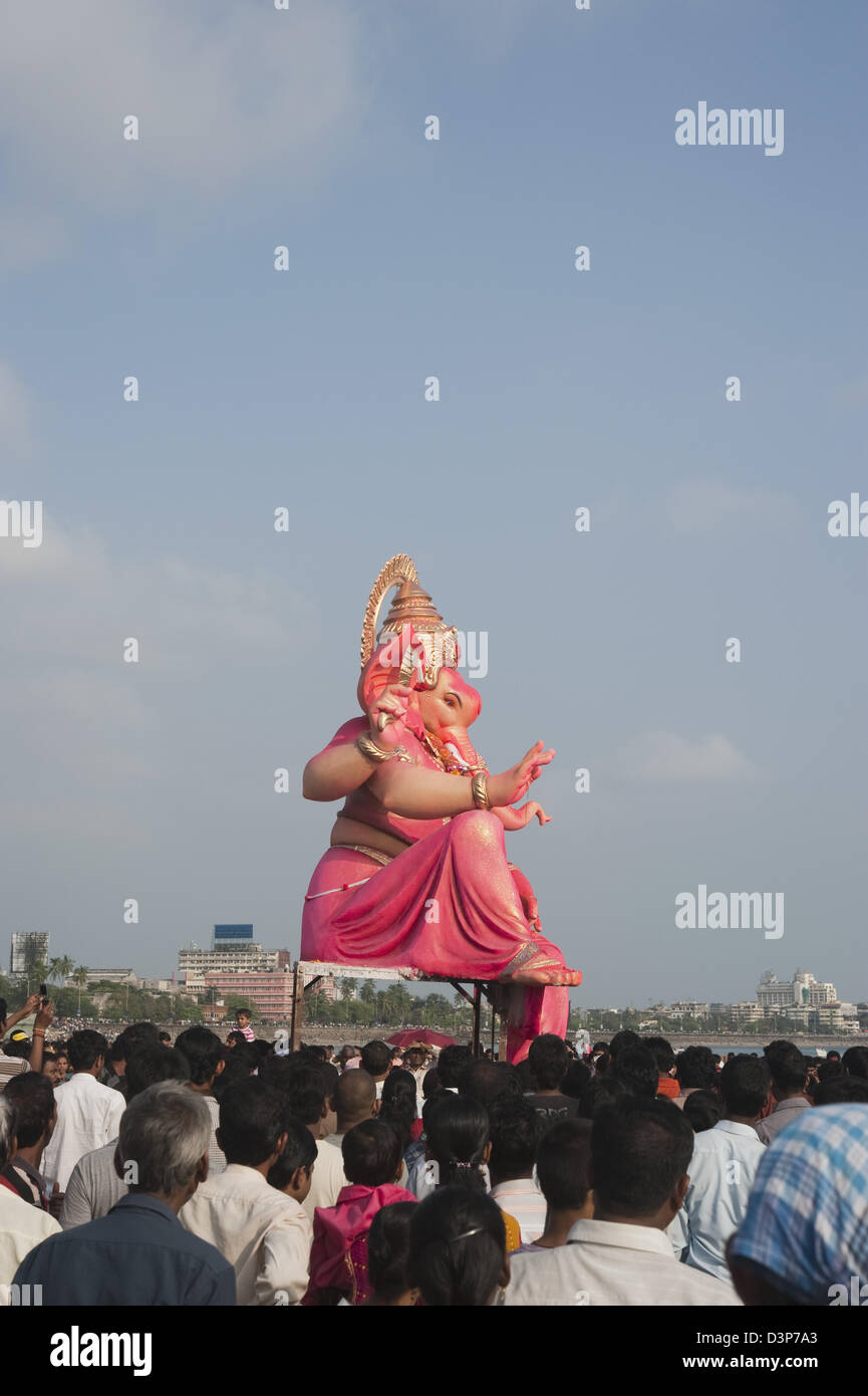 Crowd at religious procession during Ganpati visarjan ceremony, Mumbai, Maharashtra, India Stock Photo