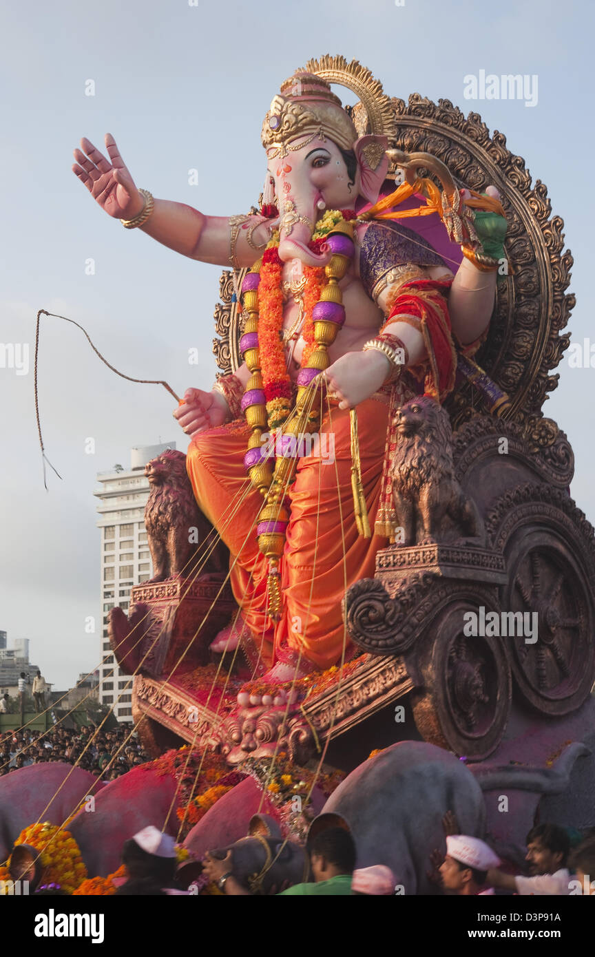 People at religious procession during Ganpati visarjan ceremony, Mumbai