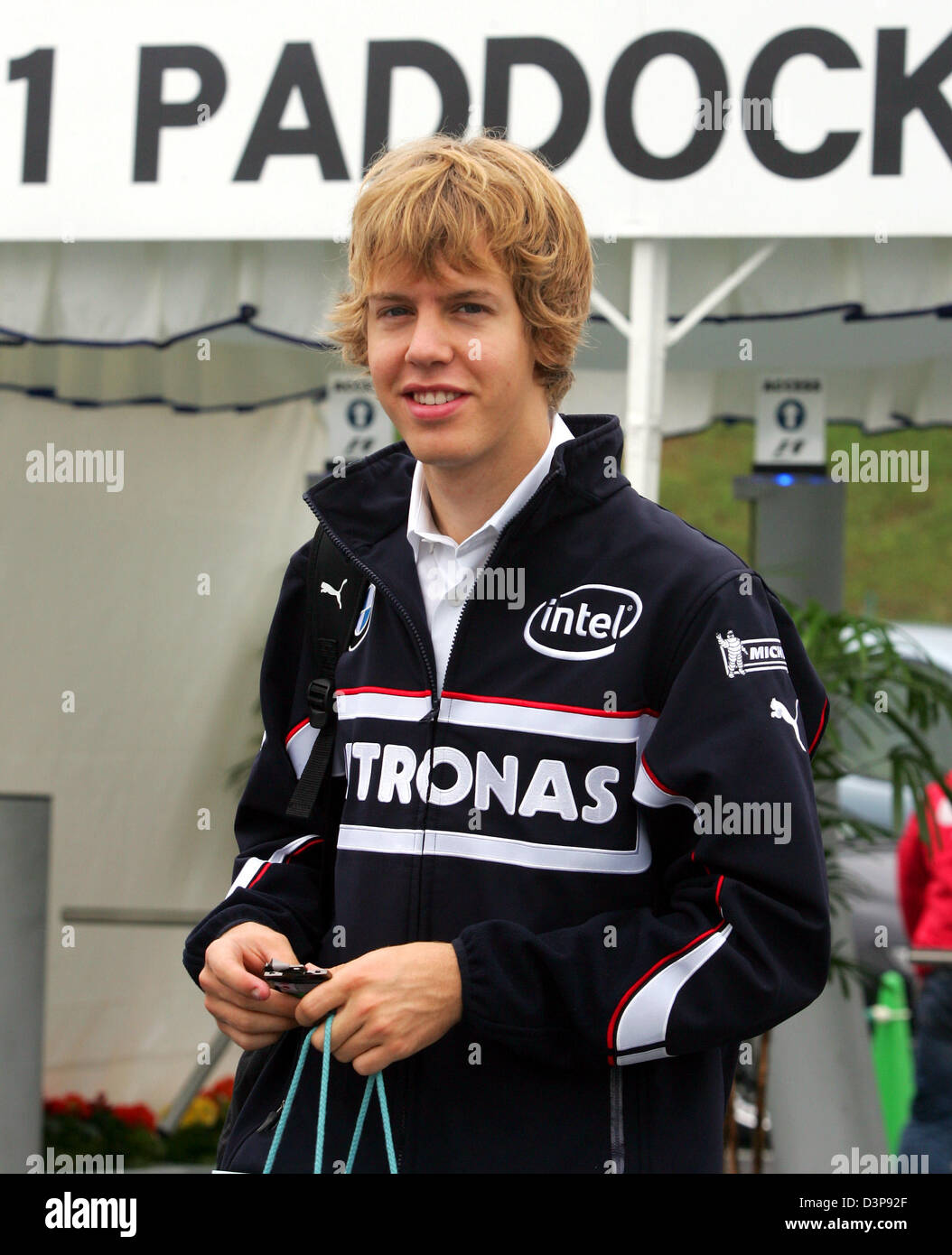 German Formula One test driver Sebastian Vettel of BMW Sauber F1 team arrives at the racetrack in Suzuka, Japan, Thursday 05 October 2006. The Japanese F1 Grand Prix will take place on Sunday 08 October 2006. Photo: Gero Breloer Stock Photo