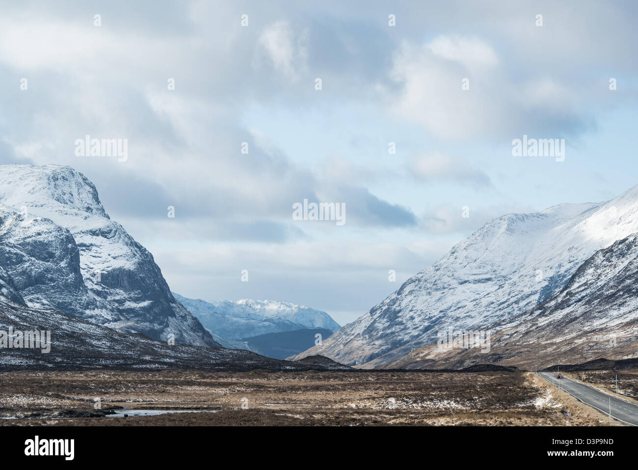 Road into Glencoe valley with Ben Fhada on the left. Stock Photo