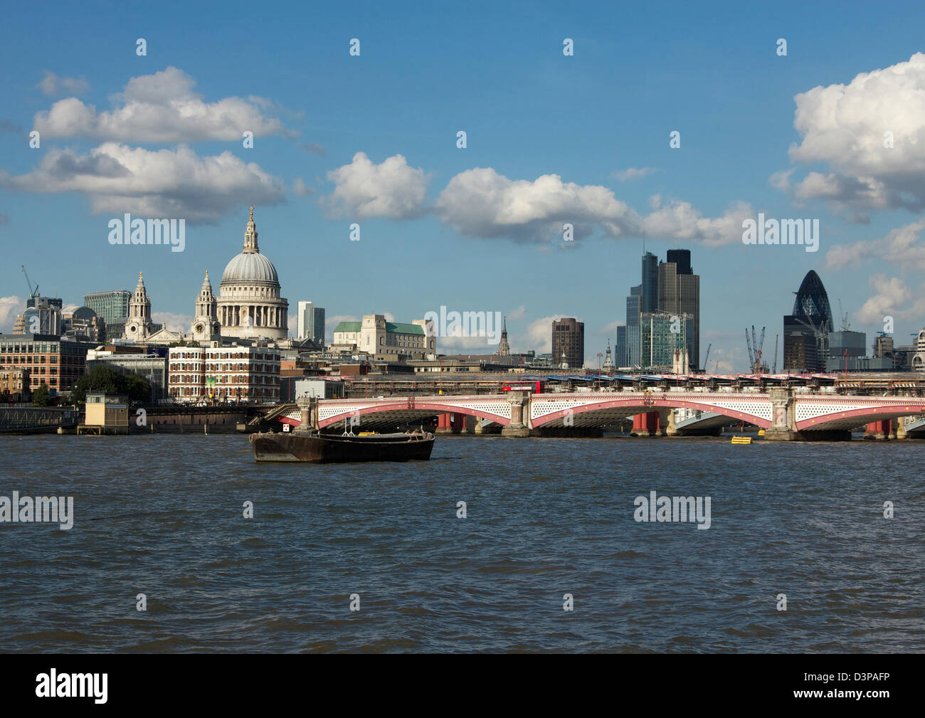 St.Paul's Cathedral and Blackfriars Bridge on the River Thames, London; The Nat West Tower and 30 St. Mary Axe in the background Stock Photo