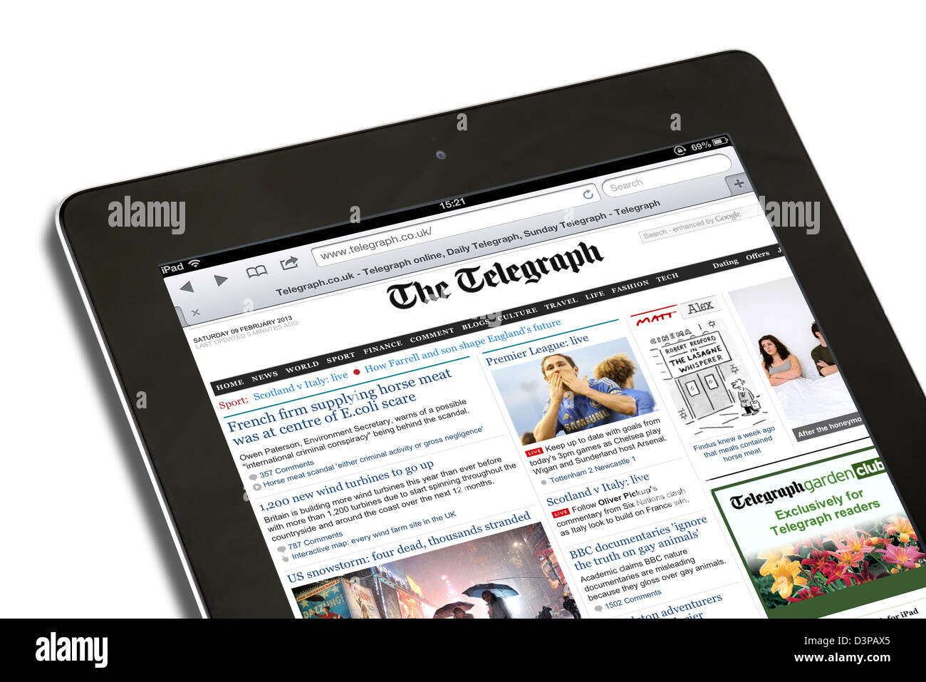 Reading the internet edition of th Telegraph Online newspaper on a 4th Generation iPad, UK Stock Photo