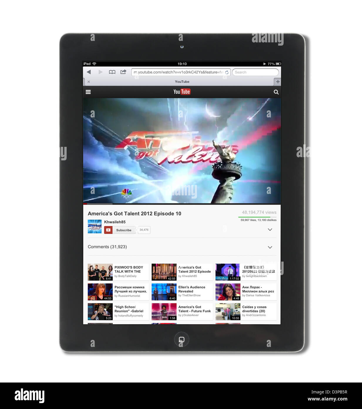 Watching a streaming video of America's Got Talent on YouTube on an iPad Stock Photo