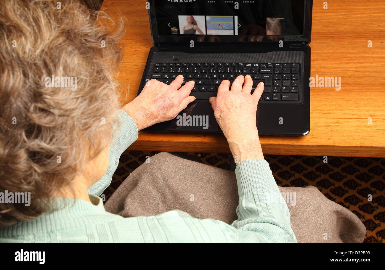Old woman with Notebook Stock Photo