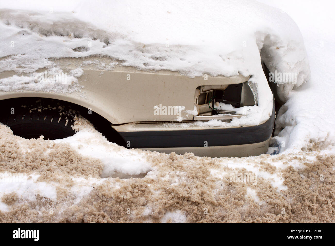 Car under snow in winter Stock Photo