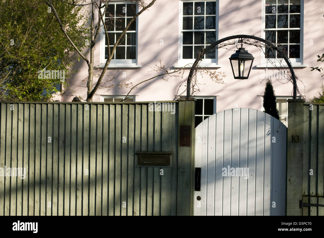 Residential house behind a fence, Hampstead Grove, Hampstead, London, UK Stock Photo