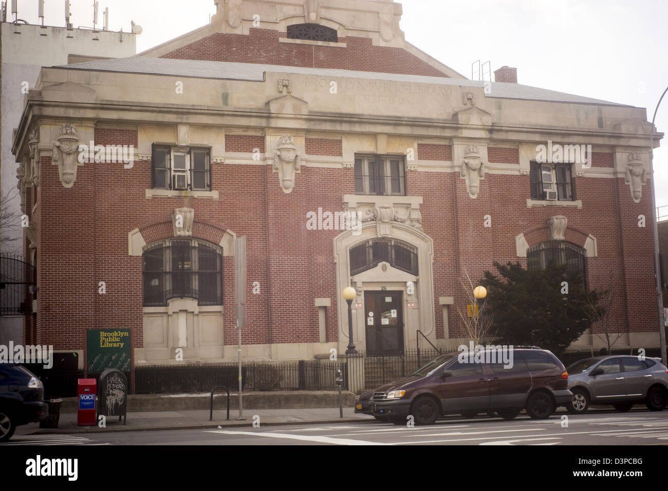 The Brooklyn Public Library Pacific Branch on busy Fourth Avenue in