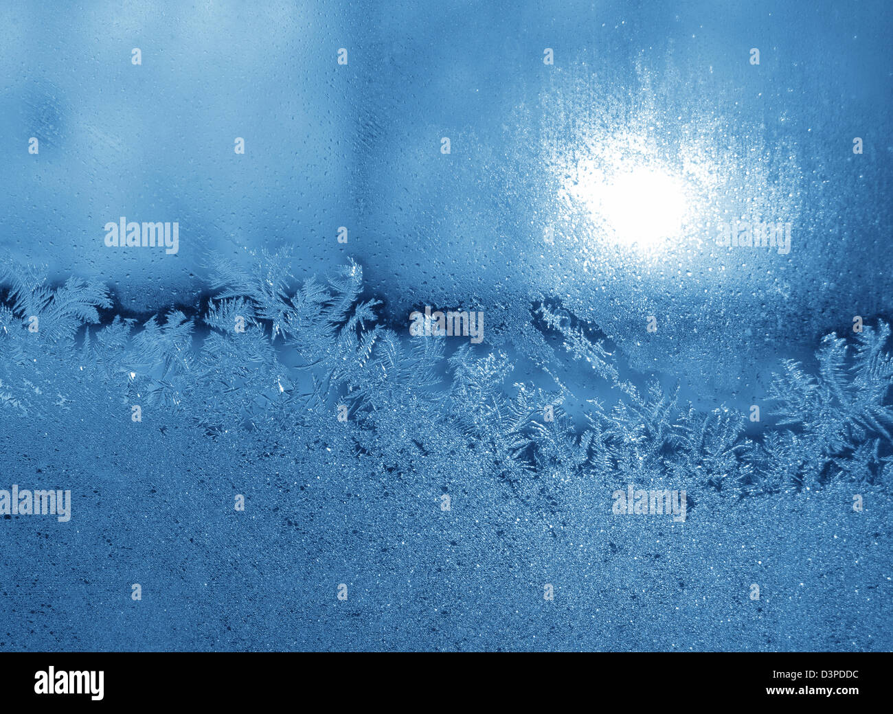 frosty natural pattern and sun on winter window Stock Photo - Alamy