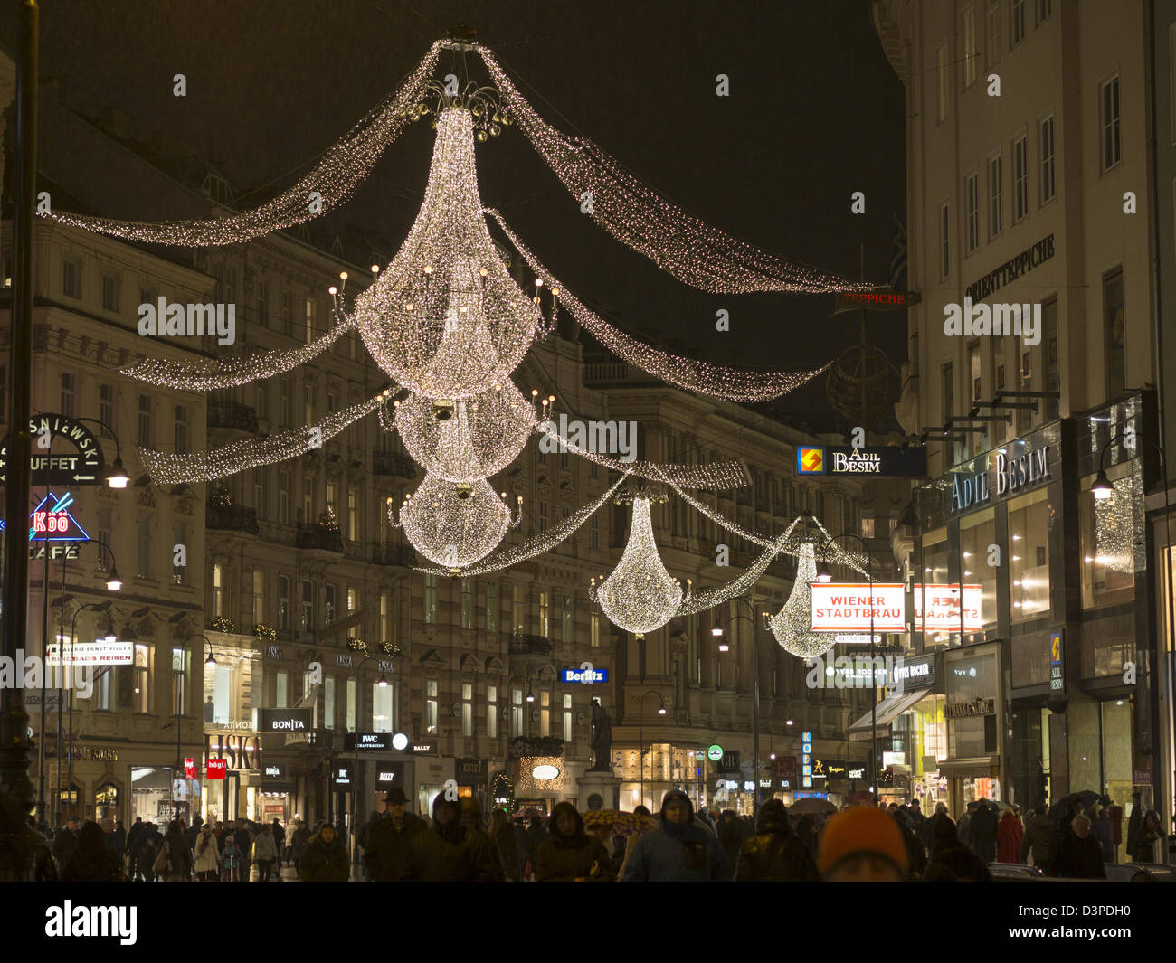 Der Graben lit up for Advent. Christmas chandeliers decorate this famous Vienna shopping street. Stock Photo