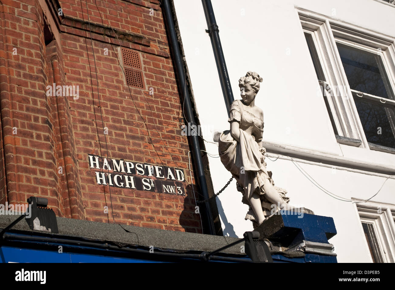 Female sculpture on Hampstead High Street, Hampstead, London, UK Stock