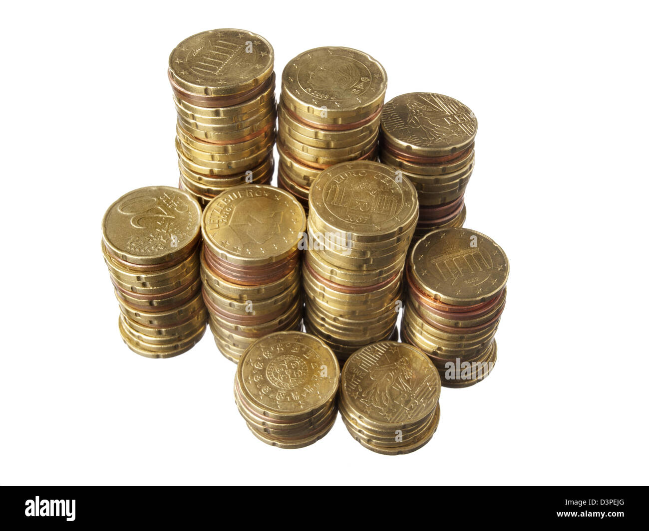 Small change, lots of Euro coins stacked, on white background. Stock Photo