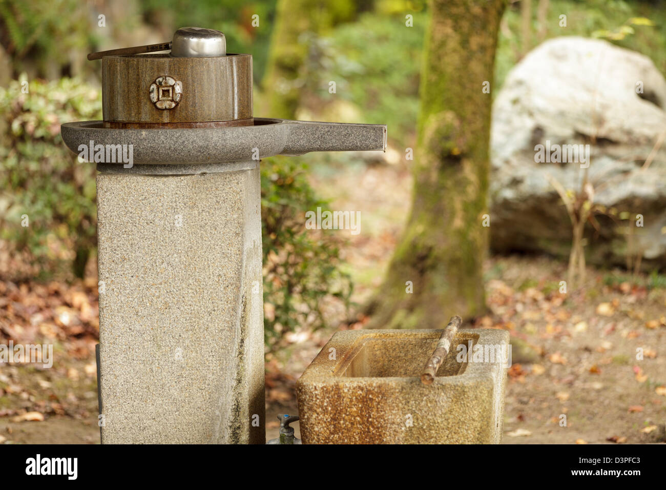 Decorated water drinking fountain in Uji street, near Kyoto, Japan