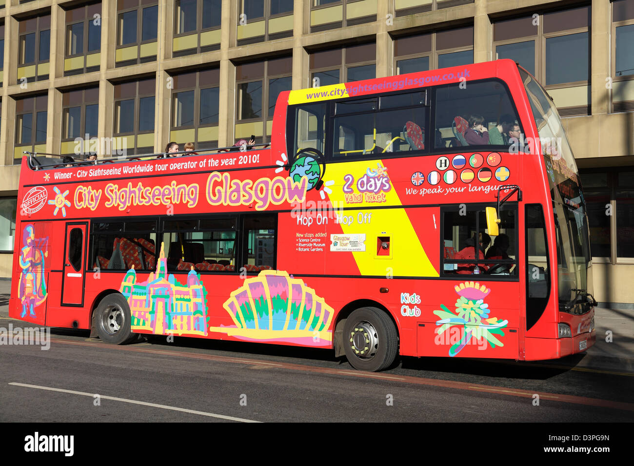 An open top tourist bus in Glasgow, Scotland, UK Stock Photo