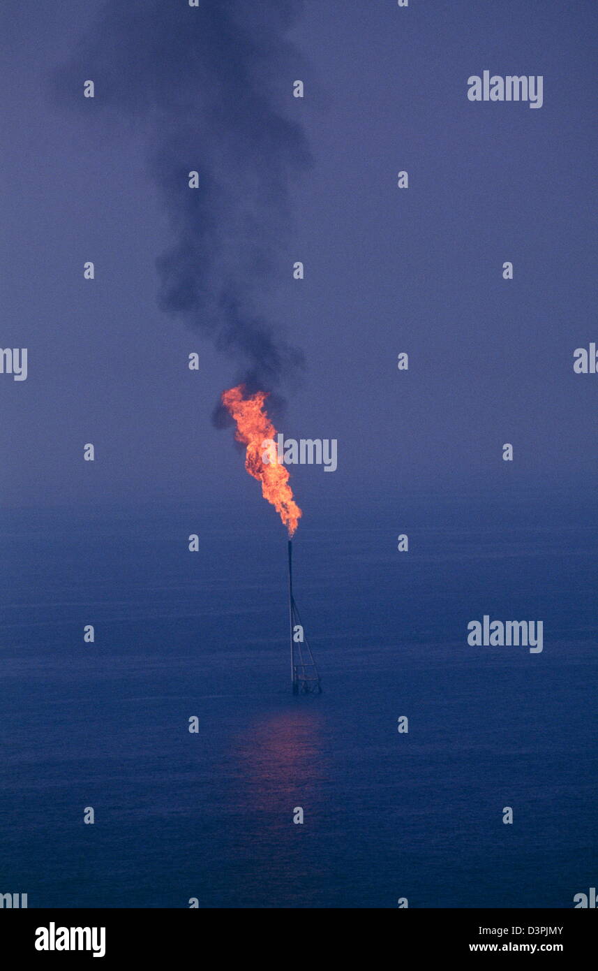 Persian Gulf, off the U.A.E. -- A natural gas flare off the coast of the United Arab Emirates. Stock Photo