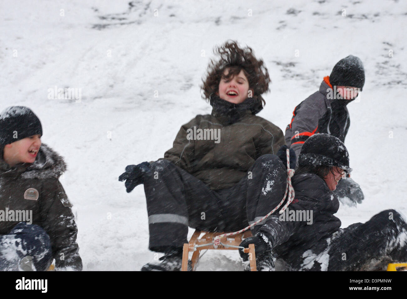 Leipzig, Germany, on children sledging the wart called Rodelberg Stock Photo