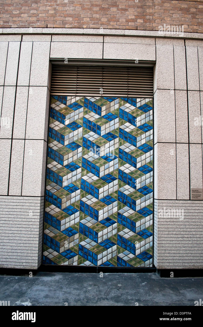 Abstract mosaic art on a wall in the City of London,, EC4, UK Stock Photo