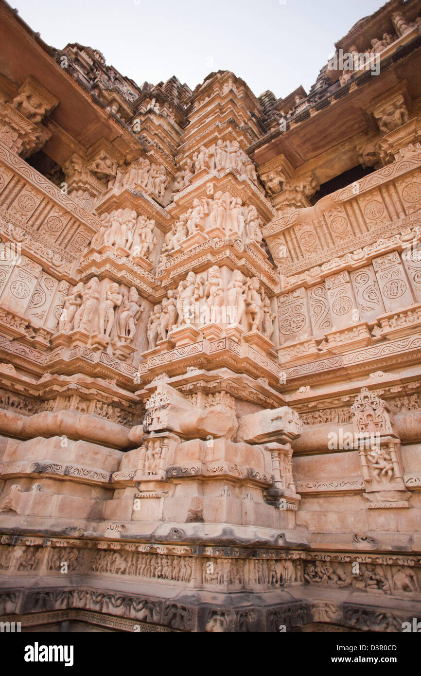Low angle view of carvings at a temple, Khajuraho, Chhatarpur District, Madhya Pradesh, India Stock Photo