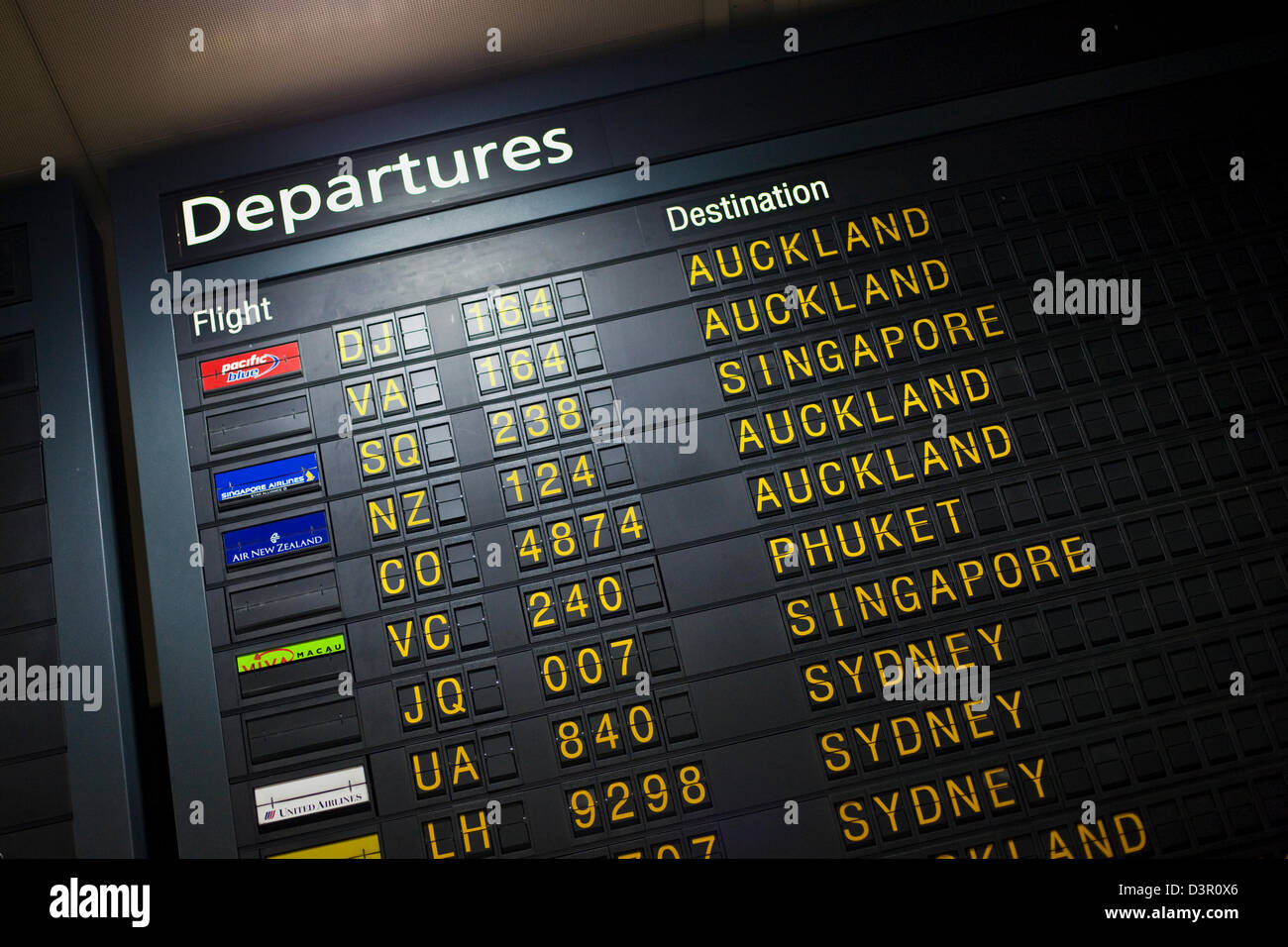 Flight departure board at international airport. Melbourne, Victoria, Australia Stock Photo