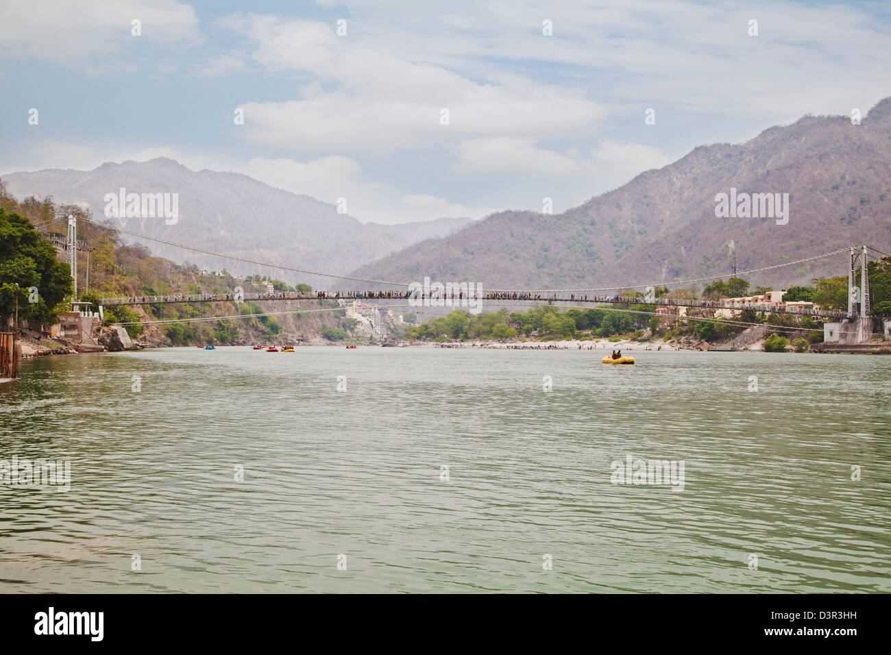 Ram Jhula across the Ganges River, Rishikesh, Uttarakhand, India Stock Photo