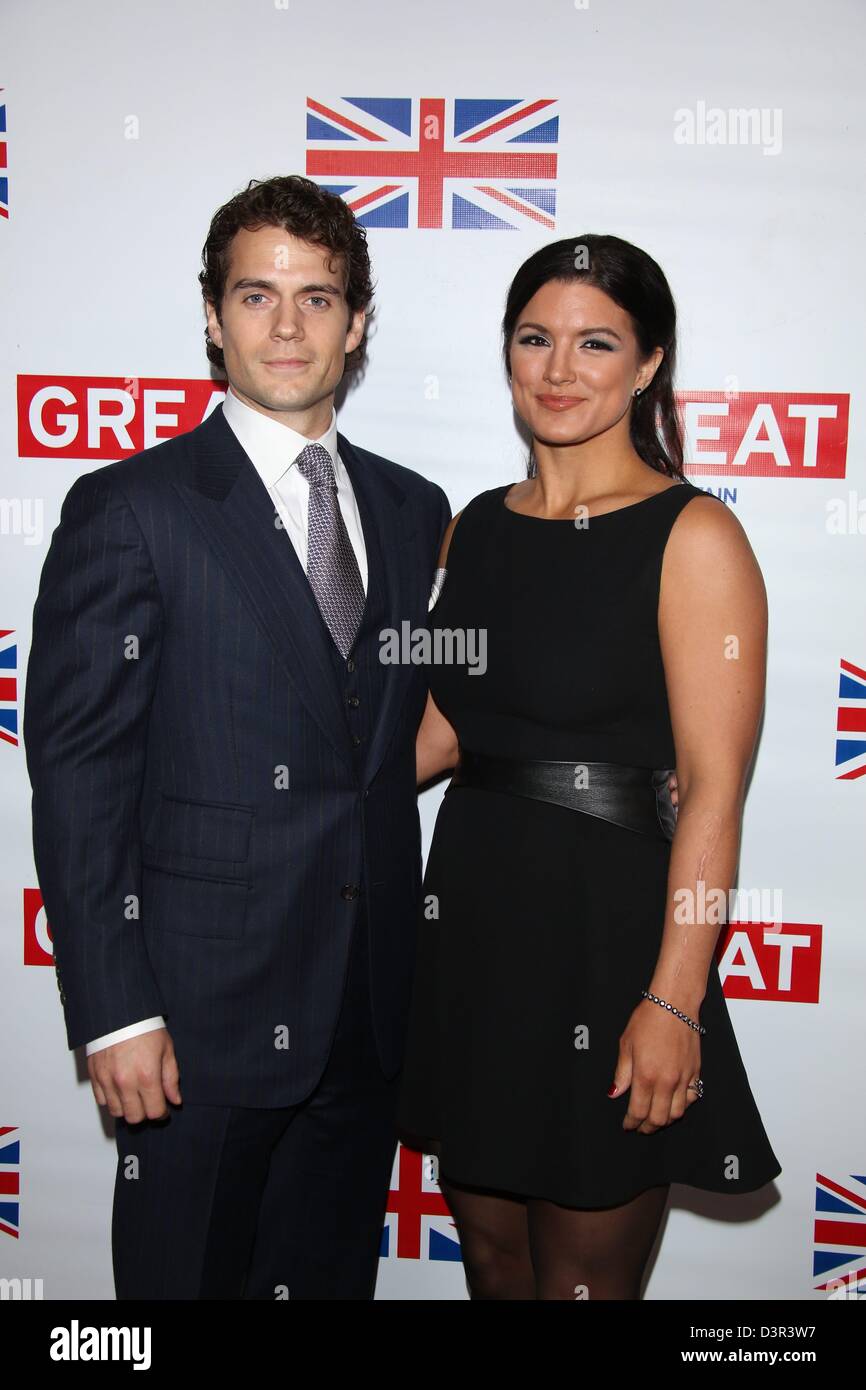 Los Angeles, USA. 22nd February 2013. Actors Henry Cavill and hois  girlfriend Gina Carano arrive at the GREAT British Film Reception at  British Consul General's Residence in Los Angeles, USA, on 22