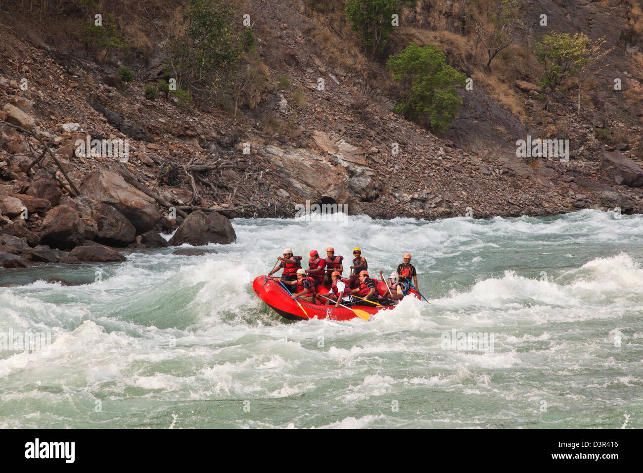 Water Rafting In Rishikesh Tourists enjoying whitewater rafting in River Ganges, Rishikesh ...