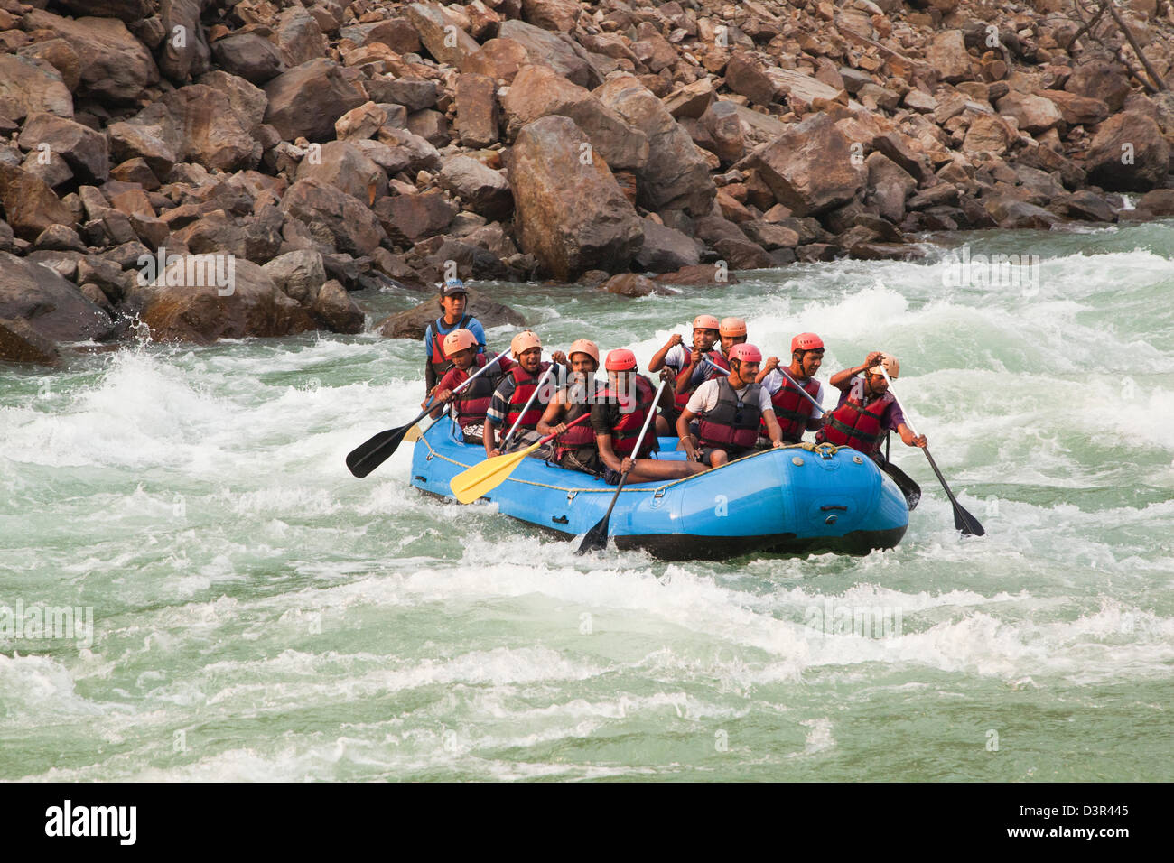 Water Rafting In Rishikesh Tourists enjoying whitewater rafting in River Ganges, Rishikesh ...