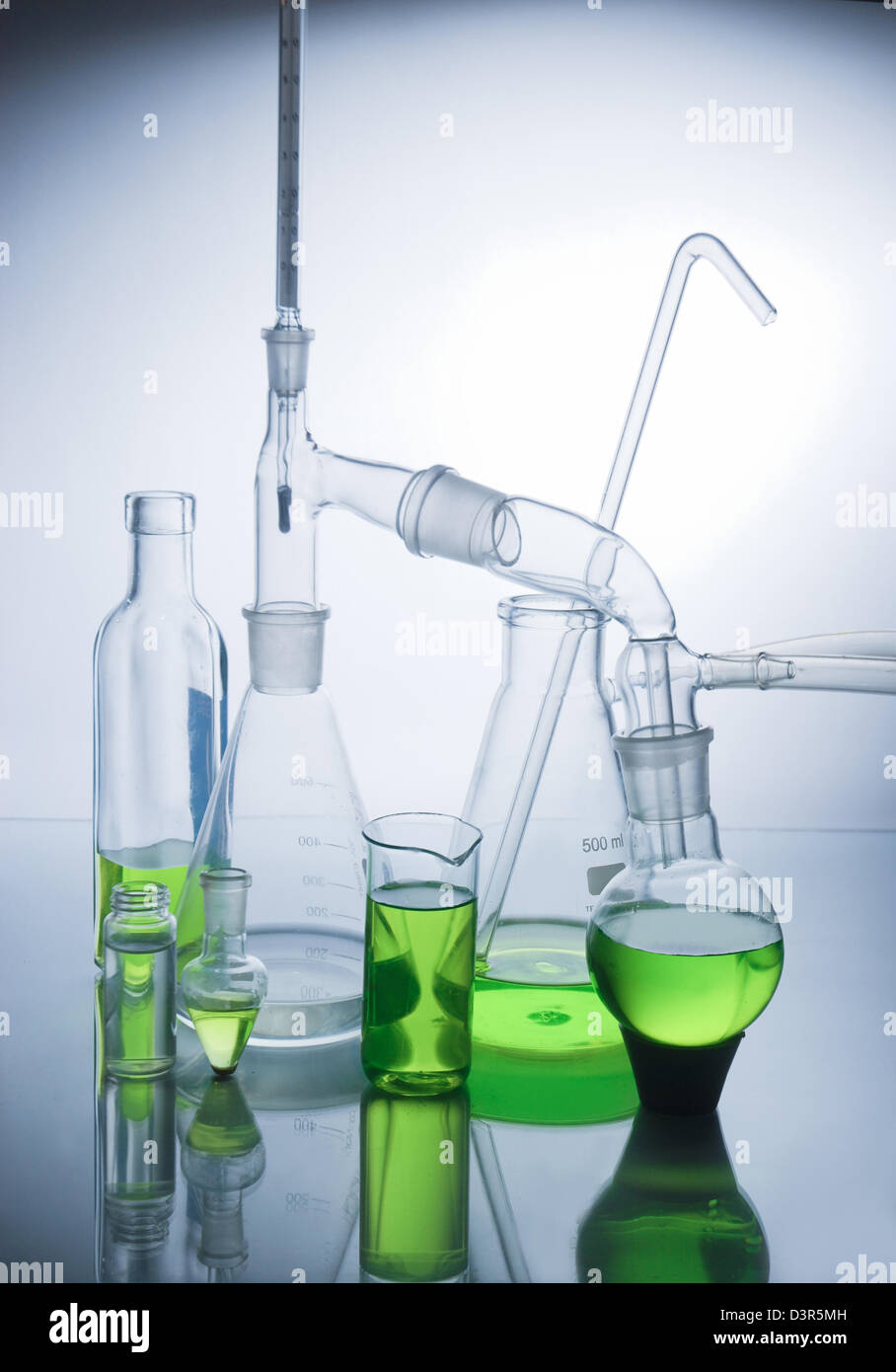 Laboratory glassware over white background Stock Photo - Alamy