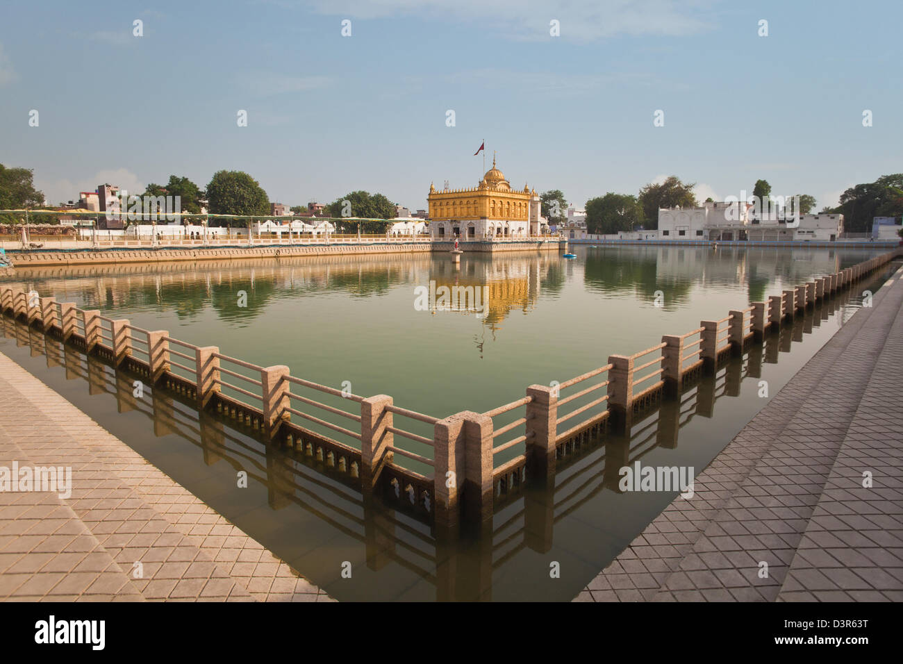 Temple in a pond, Durgiana Temple, Amritsar, Punjab, India Stock Photo