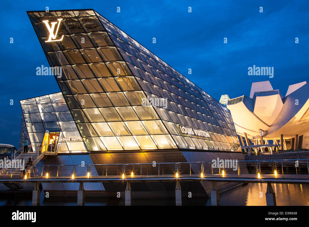Louis Vuitton Island Maison in Marina Bay, Singapore, and accessible by a  pedestrian bridge or underground from The Shoppes at Marina Bay Sands Stock  Photo - Alamy