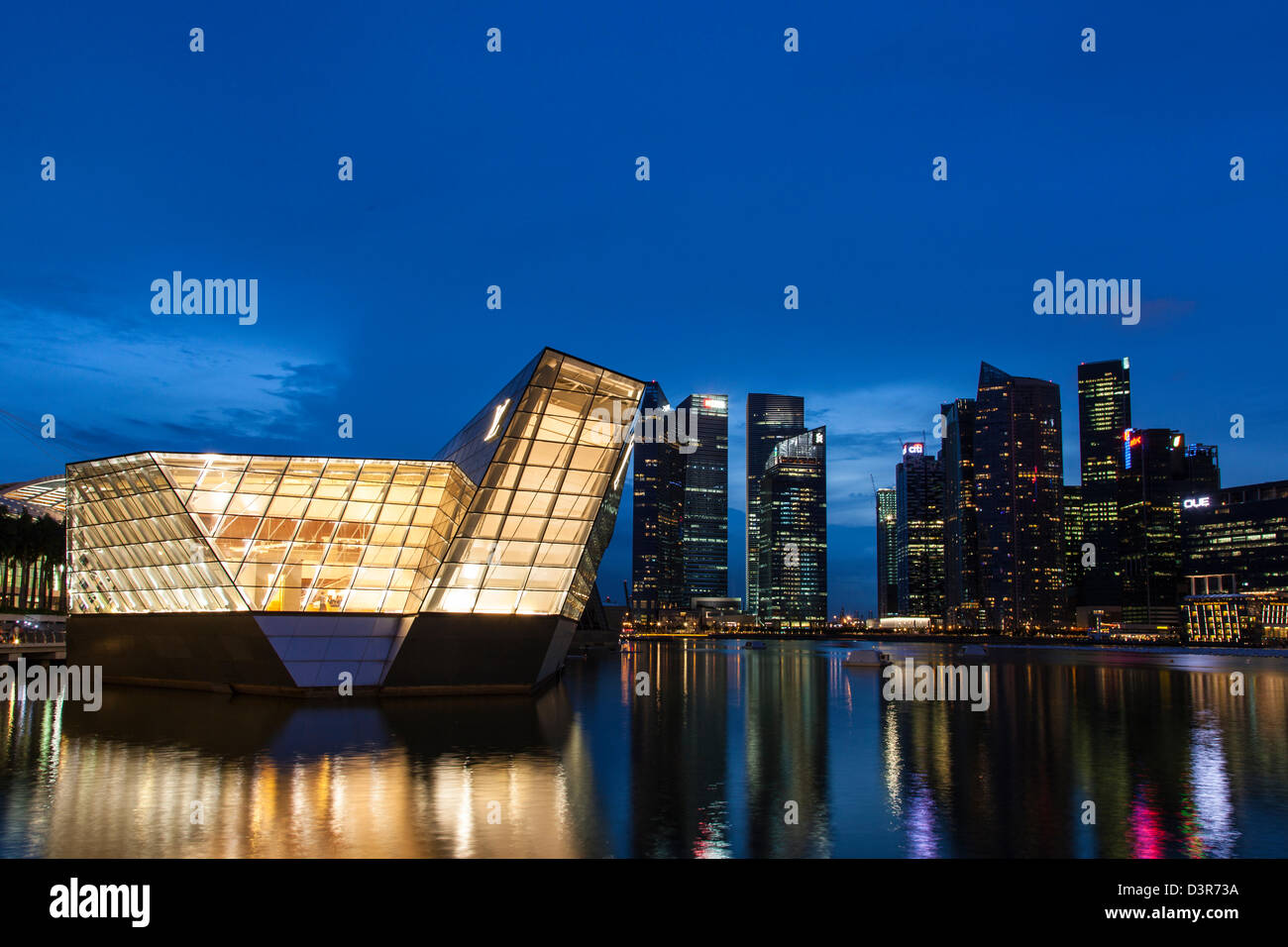 The Louis Vuitton store with modern glass and steel construction at Marina  Bay Sands set in the water of the bay in Singapore Stock Photo - Alamy