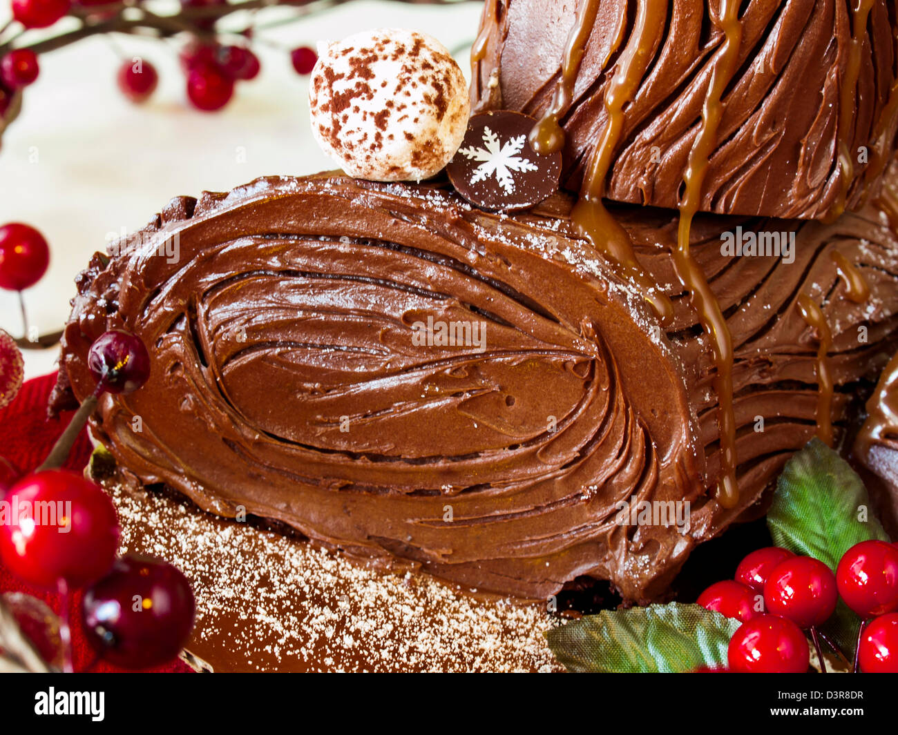 Traditional Christmas Yule Log cake decorated with marzipan mushrooms ...