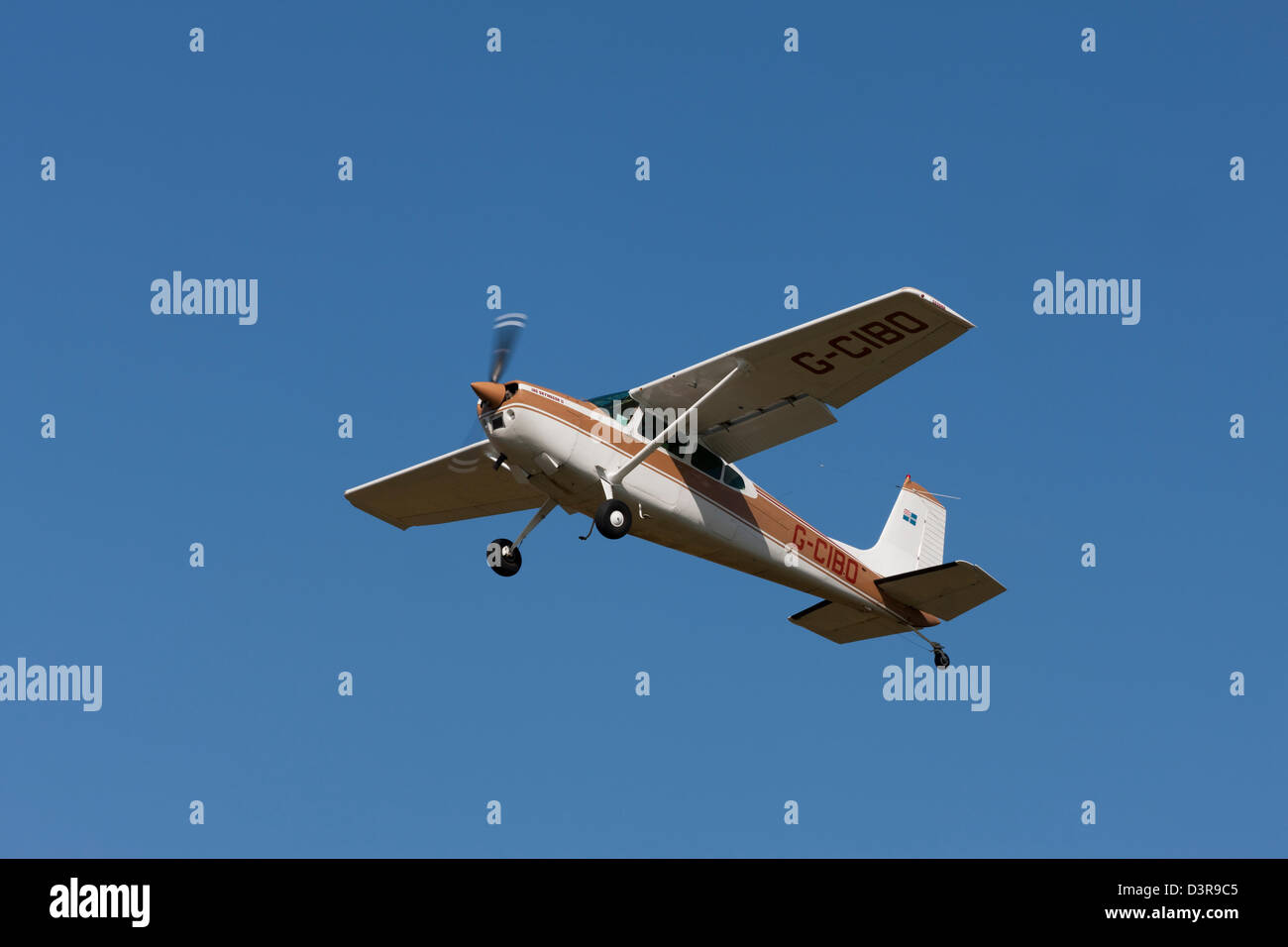 Cessna 182 Skywagon G-CIBO in flight after take-off from Breighton Airfield Stock Photo