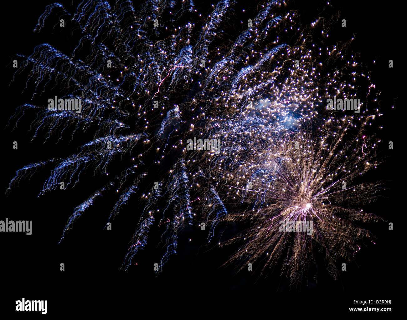 multiple fireworks blasts on black background Stock Photo