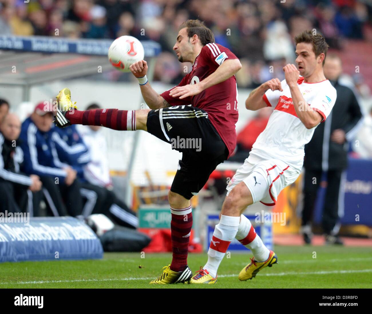 Stuttgart, Germany. 23rd February 2013. Stuttgart's Martin Harnik (R) vies for the ball with Nuremberg's Javier Pinoladuring the Bundesliga soccer match between VfB Stuttgart and FC Nuremberg at Mercedes-Benz Arena in Stuttgart, Germany, 23 February 2013. Photo: BERND WEISSBROD/dpa/Alamy Live News  (ATTENTION: EMBARGO CONDITIONS! The DFL permits the further  utilisation of up to 15 pictures only (no sequntial pictures or video-similar series of pictures allowed) via the internet and online media during the match (including halftime), taken from inside the stadium and/or prior to the start of t Stock Photo