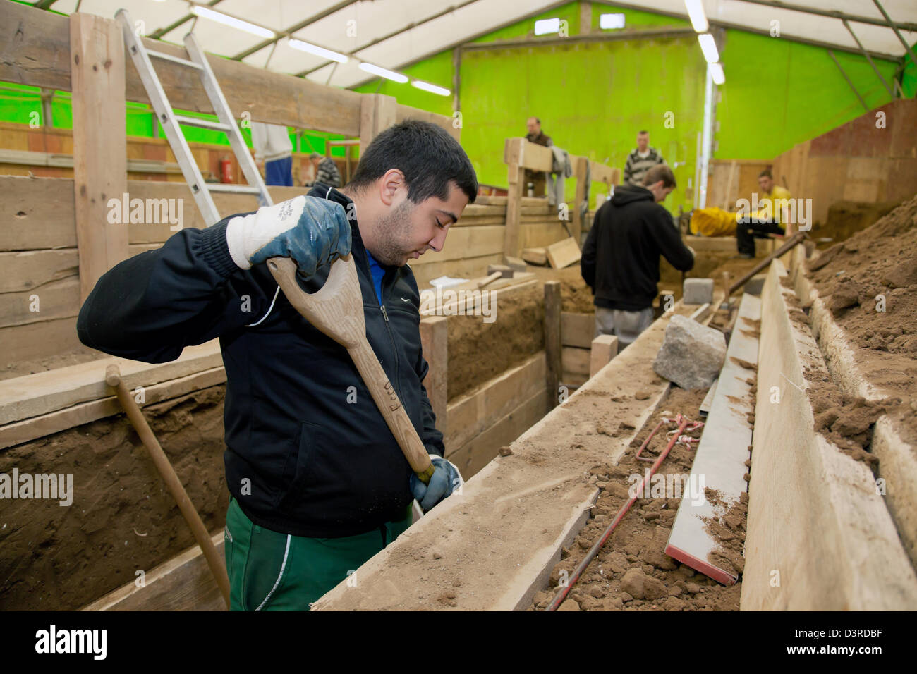 Berlin, Germany, road builders learn to dig trenches and to secure Stock Photo