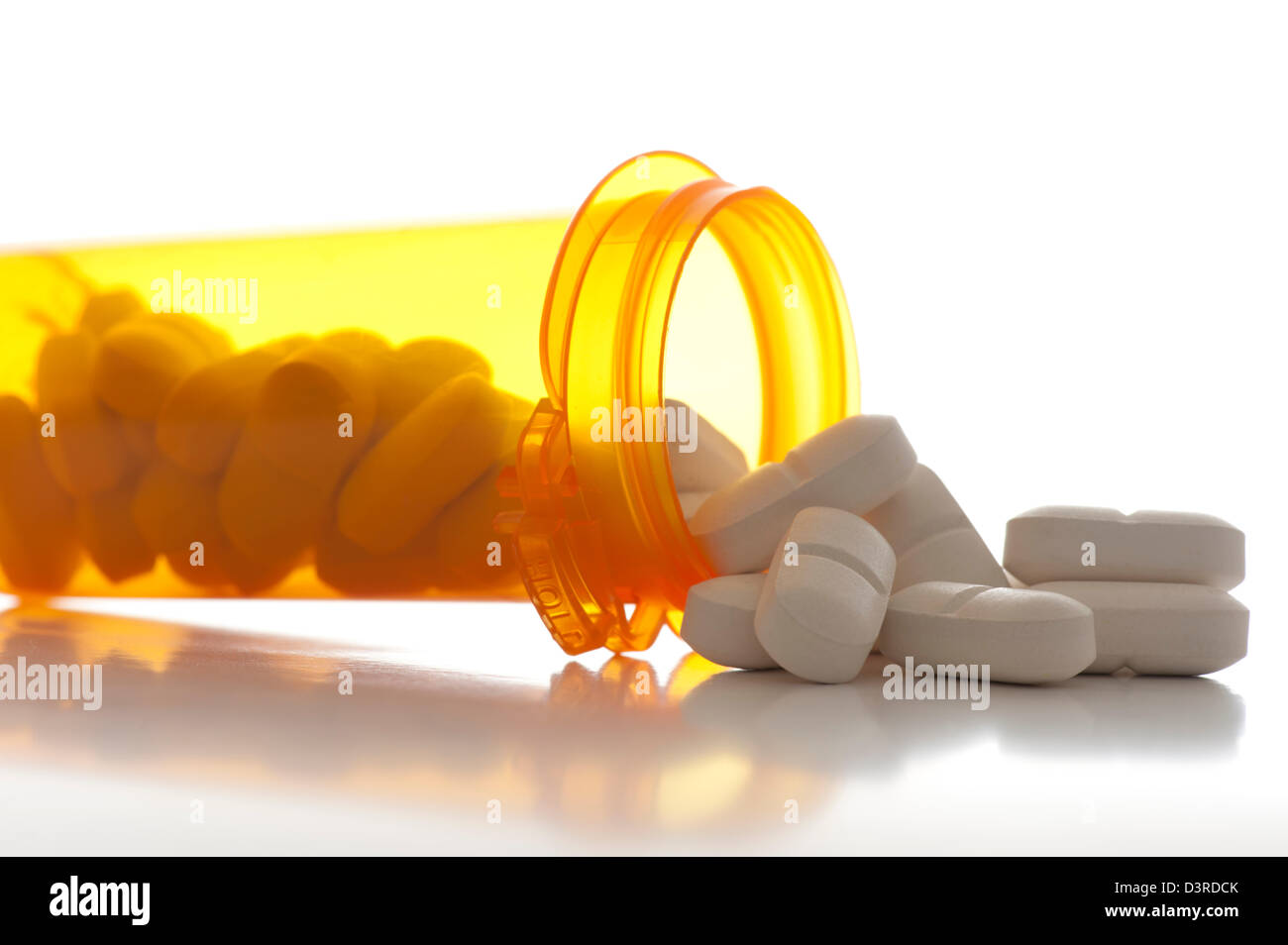 closeup view of prescription pill bottle with pills and no label Stock Photo