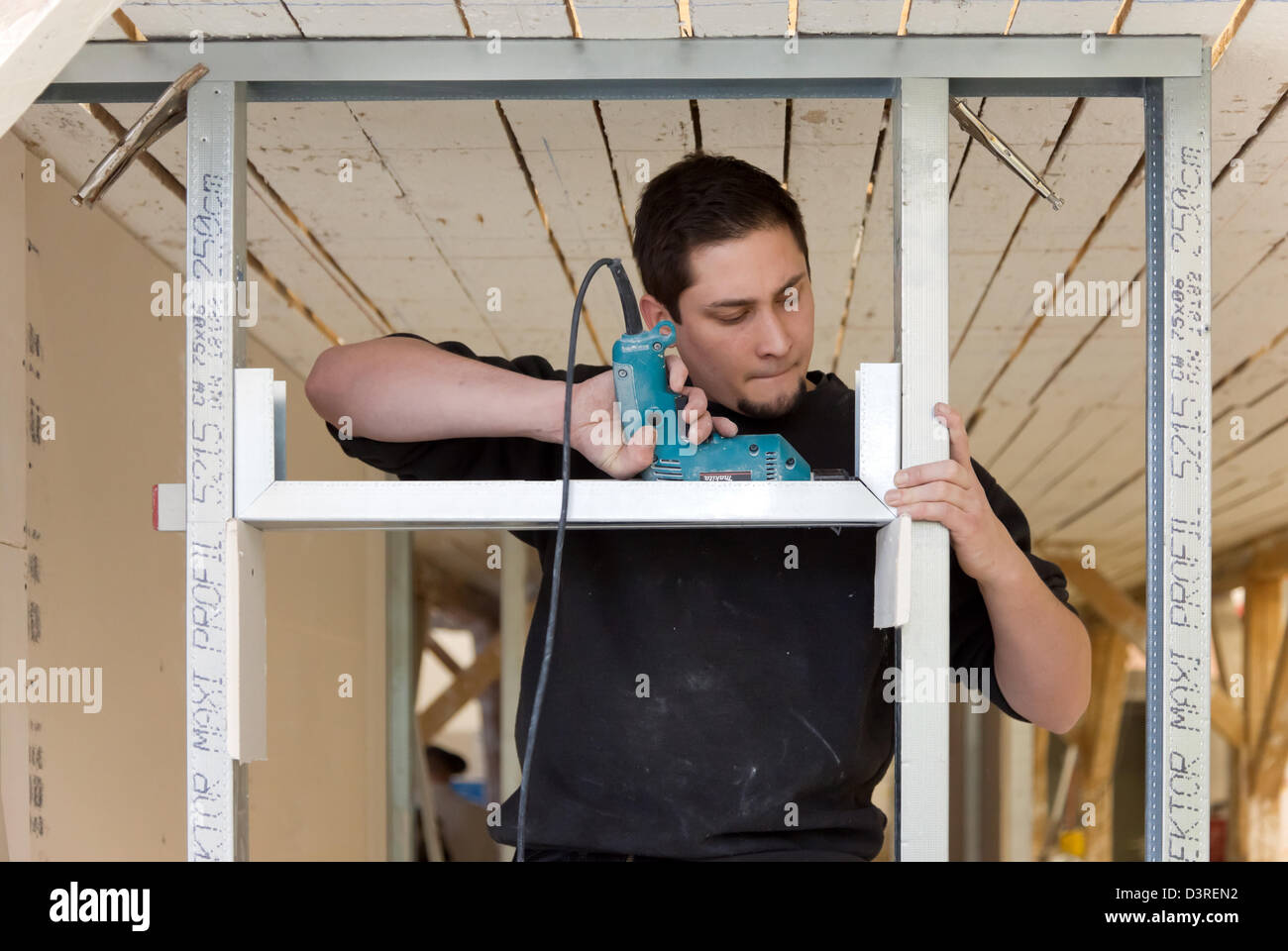 Berlin, Germany, trained as a drywall installer Stock Photo Alamy
