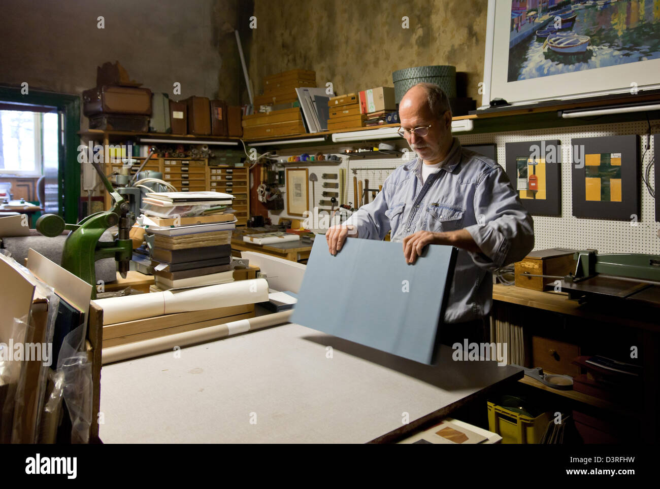 Berlin, Germany, the bookbinder Christian Kluendel in his