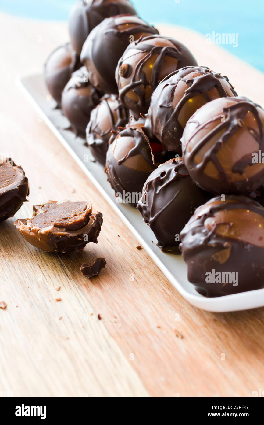 Gourmet dark milk chocolate truffles hand made by chocolatier Stock