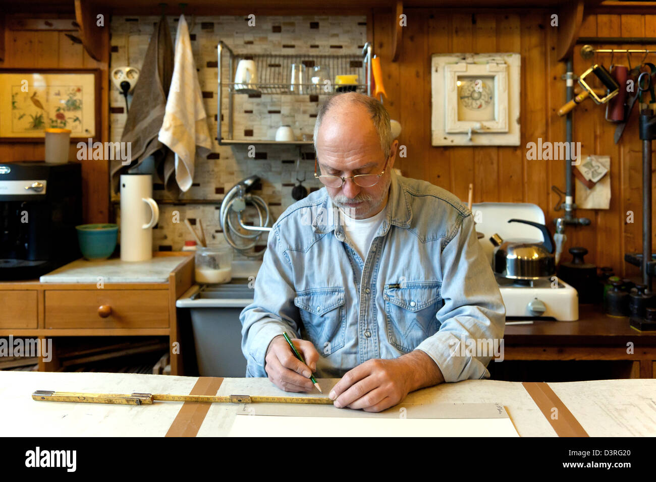 Berlin, Germany, the bookbinder Christian Kluendel in his