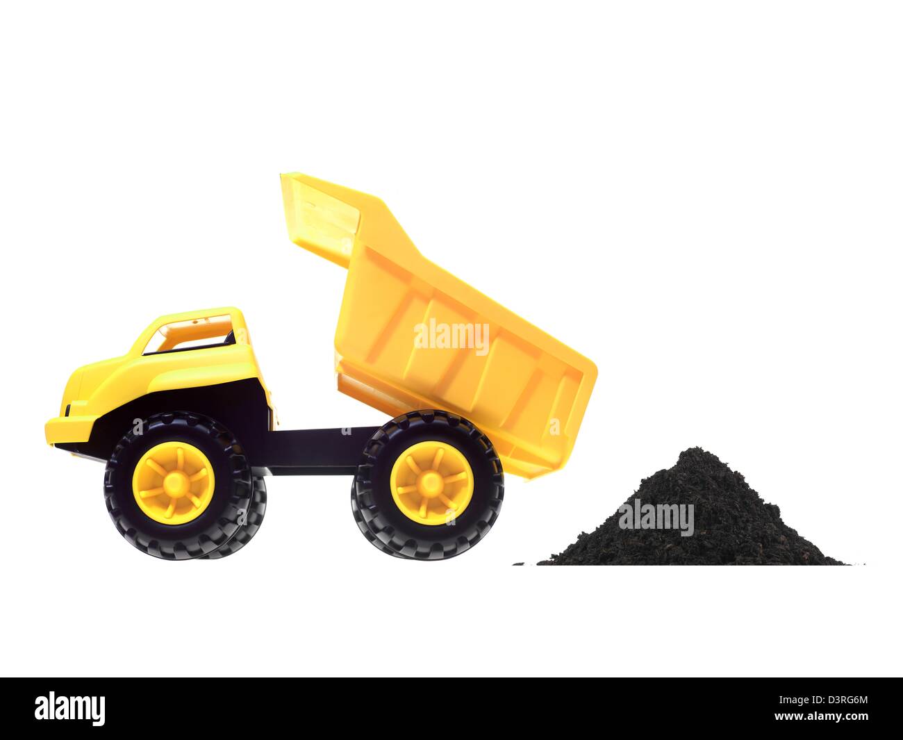 A toy dump truck isolated against a white background Stock Photo - Alamy