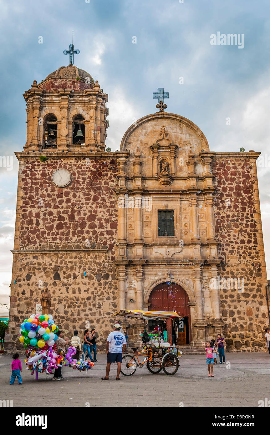 People on the plaza in front of the cathedral in the town of Tequila, Jalisco, Mexico. Stock Photo