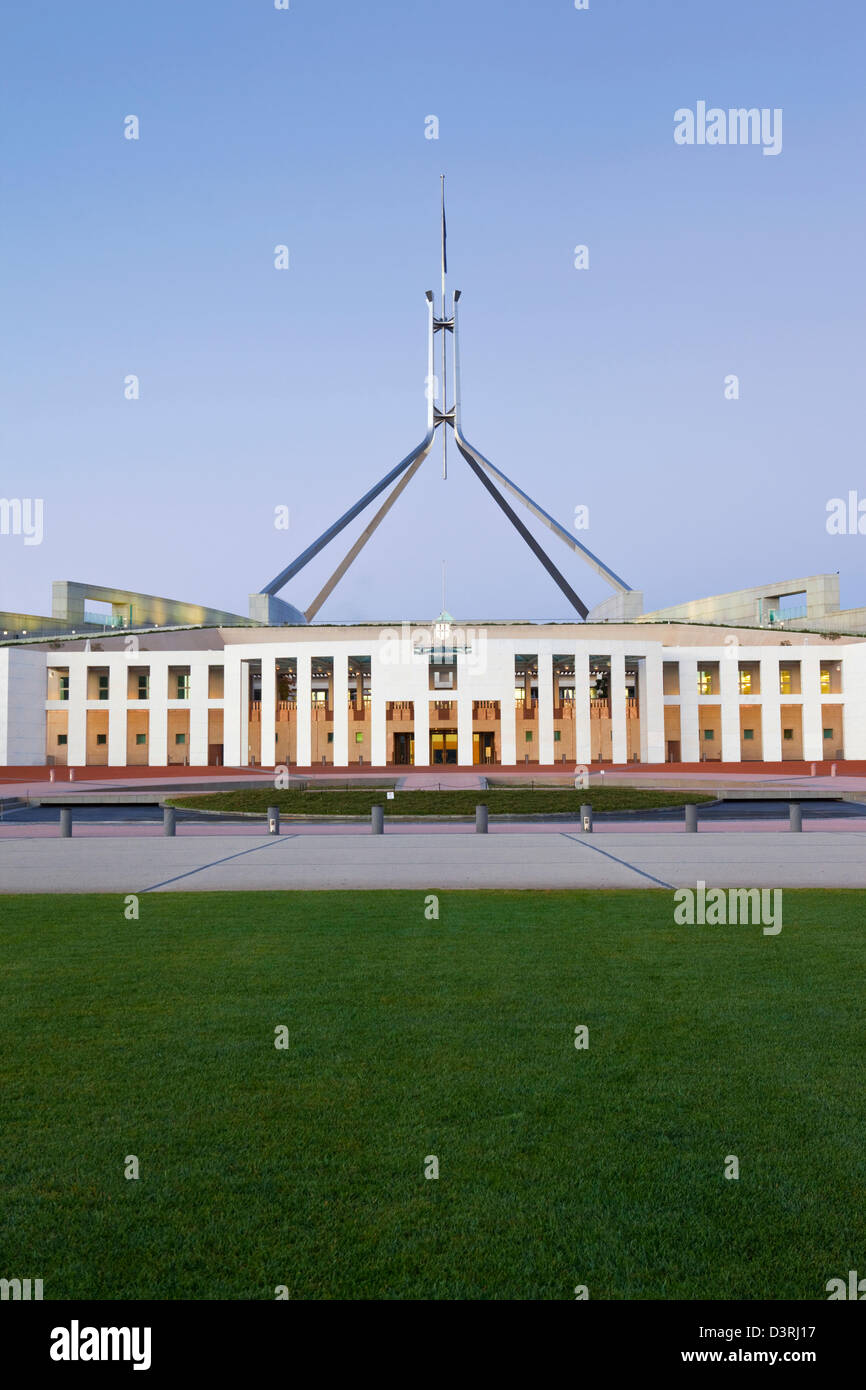 Parliament House at Capital Hill, illuminated at twilight. Canberra, Australian Capital Territory (ACT), Australia Stock Photo